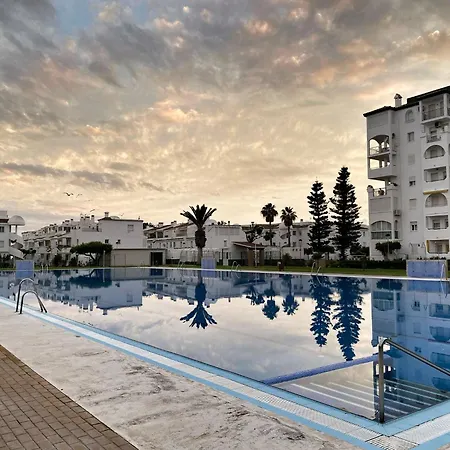 En Urbanizacion Privada Con Piscina En Primera Linea De Playa Apartment
